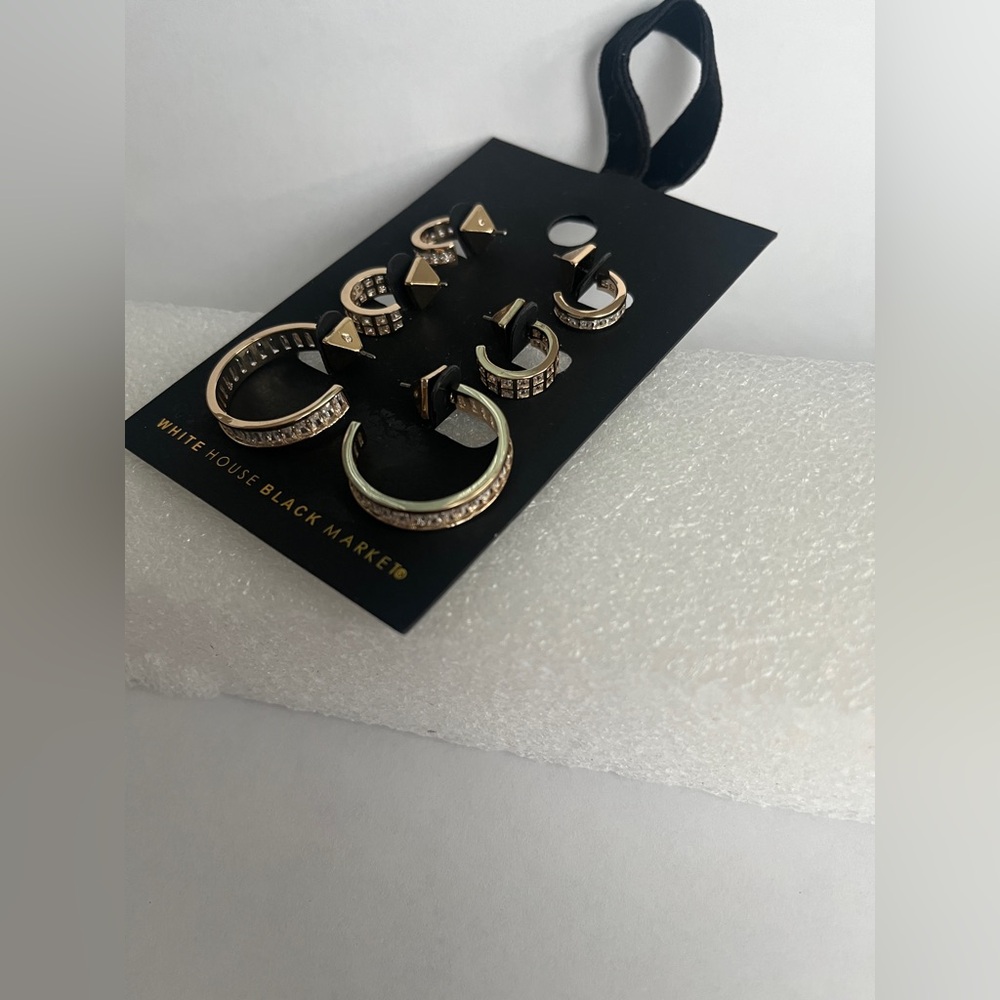 White House Black Market set of three Gold and clear crystal Hoop Earrings